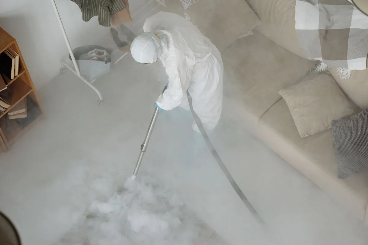 Biohazard cleanup technician in protective equipment, St. George, SC